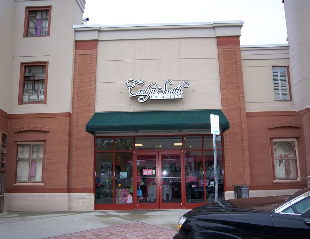 Custom illuminated building sign in Baltimore for Carlyn Smith Creations by Giovanni's Signs