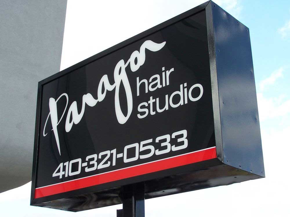 Custom hair salon storefront signage in Baltimore, MD for Paragon Hair Studio by Giovanni's Signs